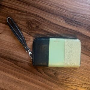 Fossil wristlet. Little wear on the strap.